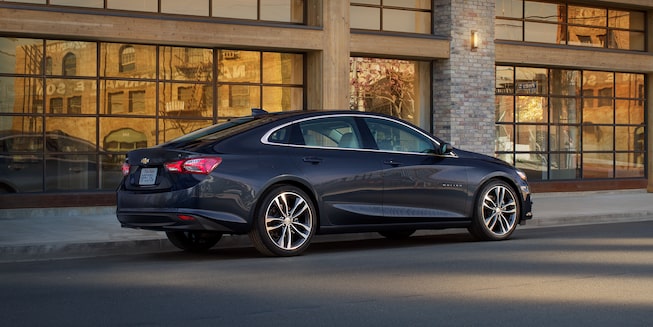 The 2023 Malibu Parked Downtown During Sunset