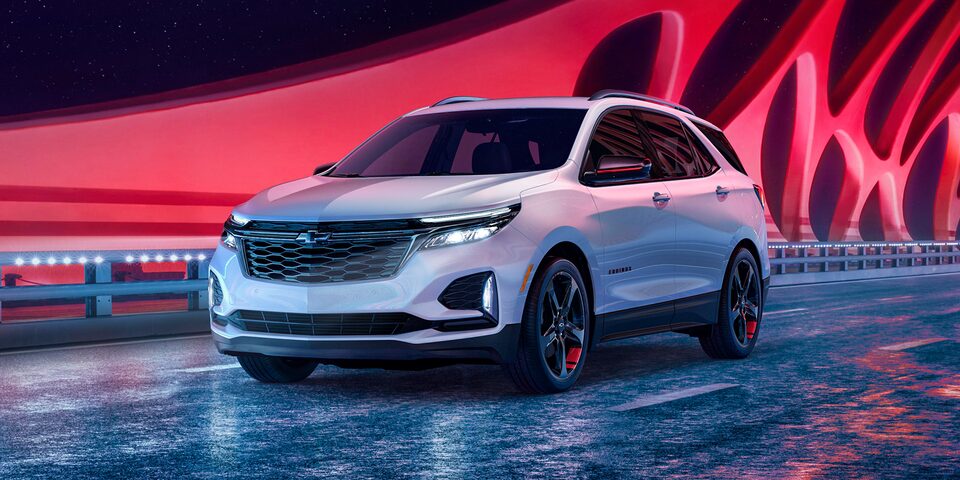 The 2023 Equinox Redline Edition on a bridge.