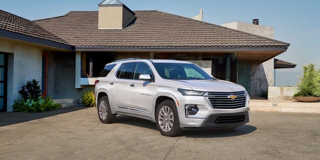 2023 Chevrolet Traverse Mid-Size SUV Exterior Parked in Family's Driveway.