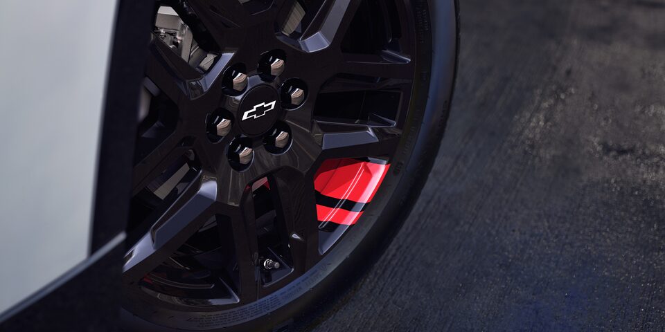 2023 Chevrolet Traverse Mid-Size SUV Exterior in Redline Edition Trim Close-Up View of Rims.