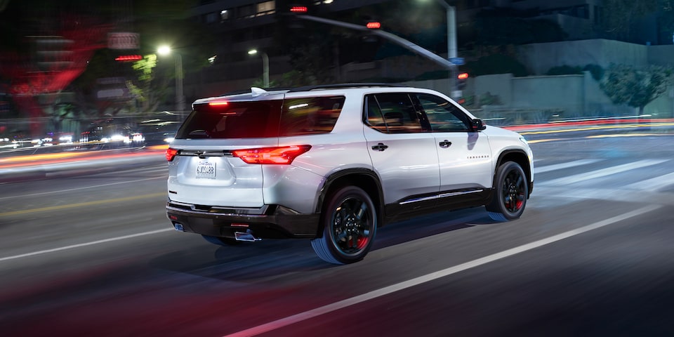 2023 Chevrolet Traverse Mid-Size SUV in Redline Edition at Night.