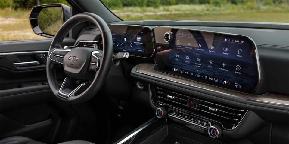 2025 Chevrolet Tahoe and 2025 Chevrolet Suburban steering wheel and infotainment system.