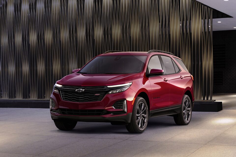 The 2024 Chevrolet Equinox RS parked outside on a sunny day.