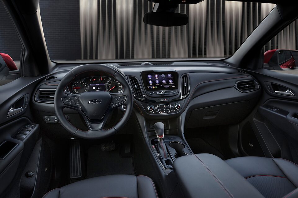 The comfortable steering wheel and technology packed infotainment system of the 2024 Chevrolet Equinox.