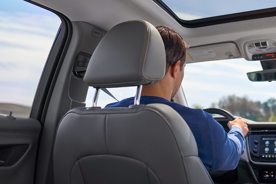Man Manually Driving Vehicle.
