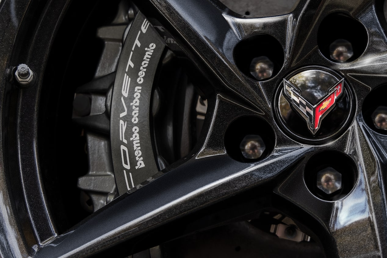 Close-up of 2024 Corvette E-Ray brake calipers on the wheels.