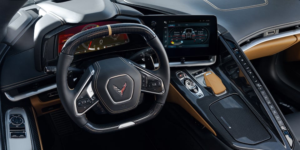 Driver’s Seat View of the Steering Wheel and Dashboard of a Chevrolet Corvette E-Ray.