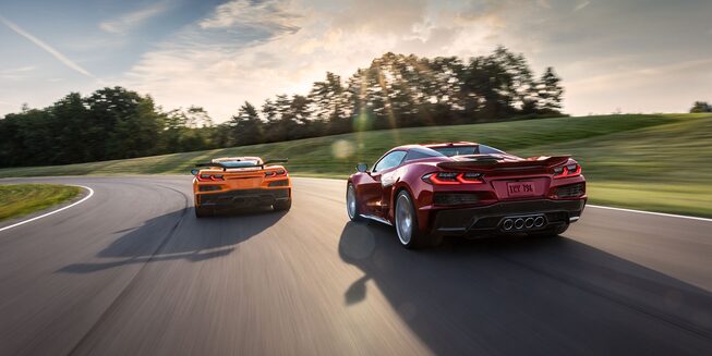 Rear View Of Two 2023 Chevrolet Corvette Z06 Driving.
