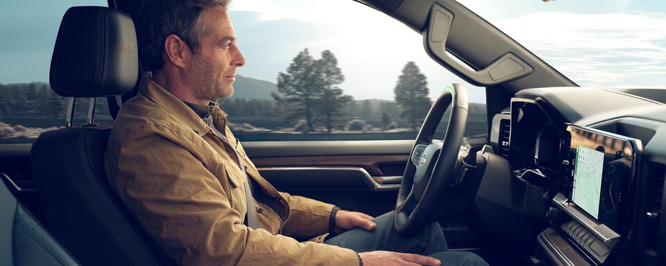A driver using the 2023 Silverado 1500's Super Cruise feature.