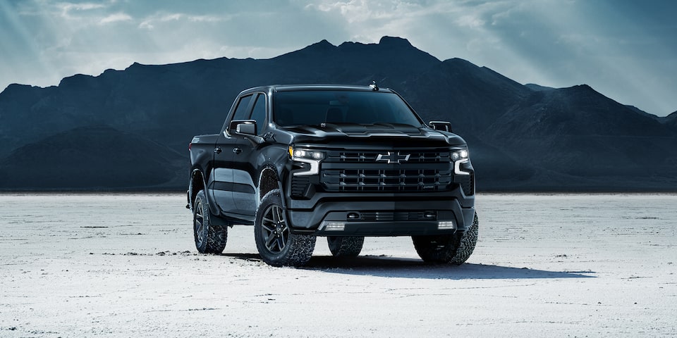 The imposing 2024 Chevrolet Silverado Midnight edition on a snowy environment.