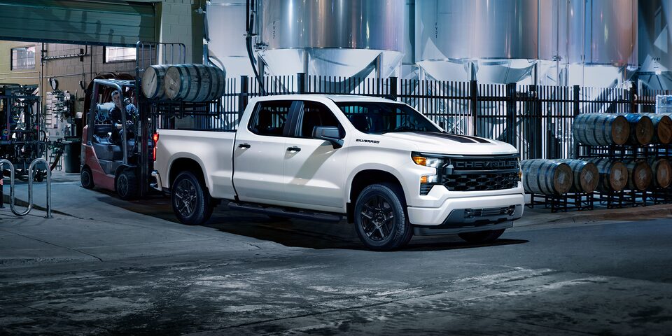 The bold 2024 Chevrolet Silverado Rally Edition parked inside a facility.