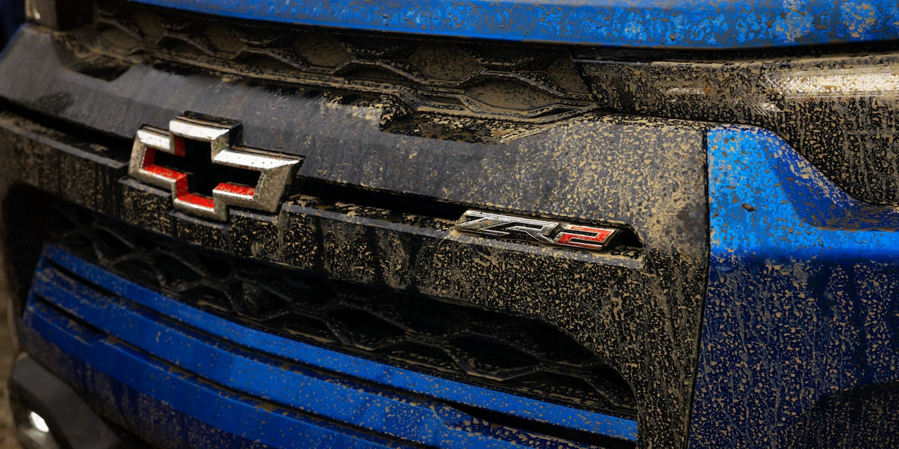 Close-Up view of Blue Chevrolet ZR2's Grille and Badging.