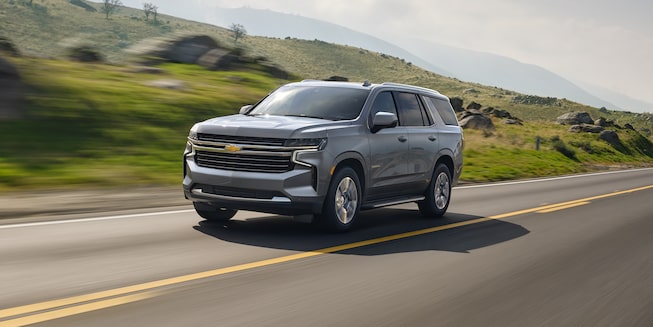 2022 Chevrolet Tahoe Full-Size SUV Exterior Front Side View Driving.