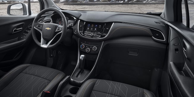 2022 Trax interior dashboard and front seats.
