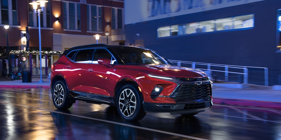 2023 Chevrolet Blazer sporty mid-size SUV driving at night.