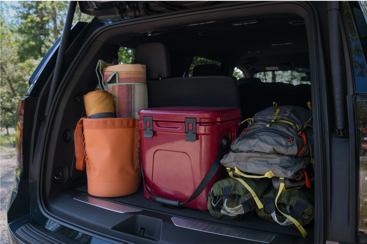 View of the trunk full of bags inside the 2025 Chevrolet Tahoe SUV.