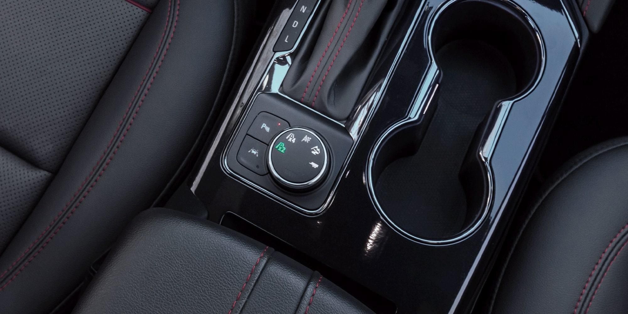 Close-up view of the Shifter and Center Console Inside the 2026 Chevrolet Blazer.