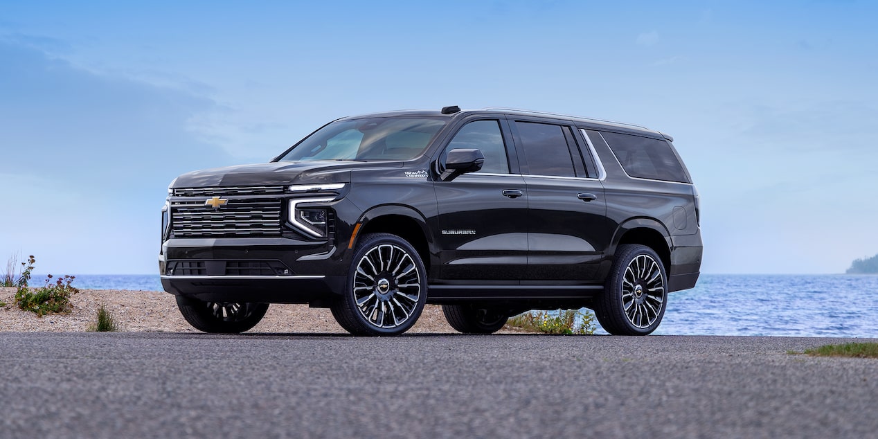 Front Three-quarters View of the 2026 Chevrolet Suburban Parked Near the Lake.