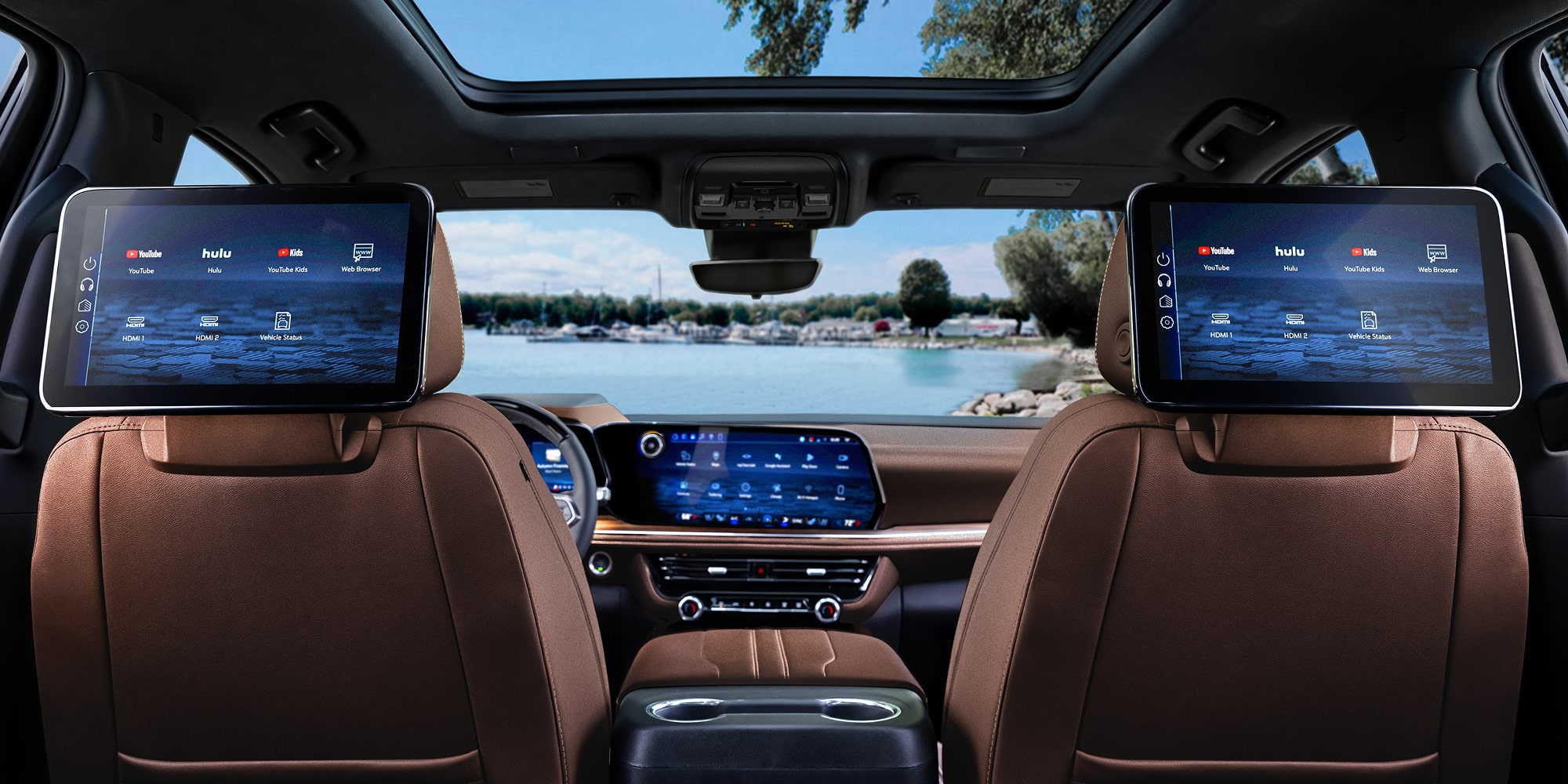 Second Row View of the Entertainment Screens on the Back of the Headrests in the 2026 Chevrolet Suburban SUV.