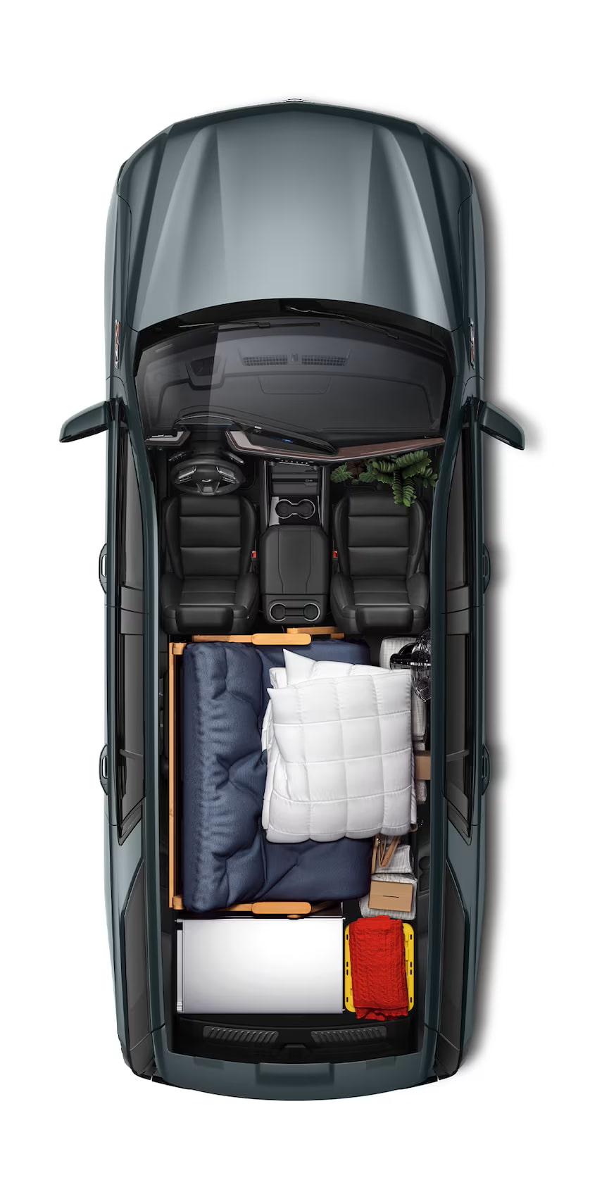 A Top View of the 2026 Chevrolet Tahoe Interior with Camping Materials Packed Up to the Second Row.