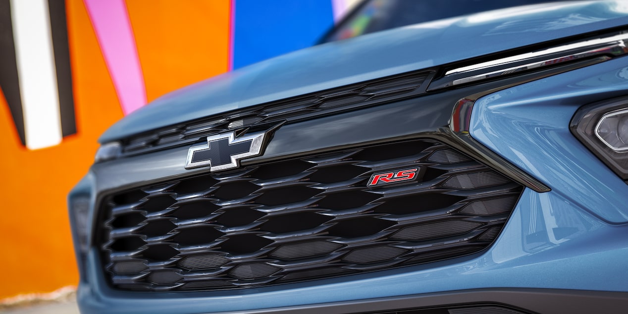 Close up view of the mesh grille and RS badging of the 2026 Chevrolet Trailblazer RS trim.