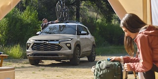 2026 Chevy Trailblazer Parked at a Campsite with a Bike Attached to the Roof Rack