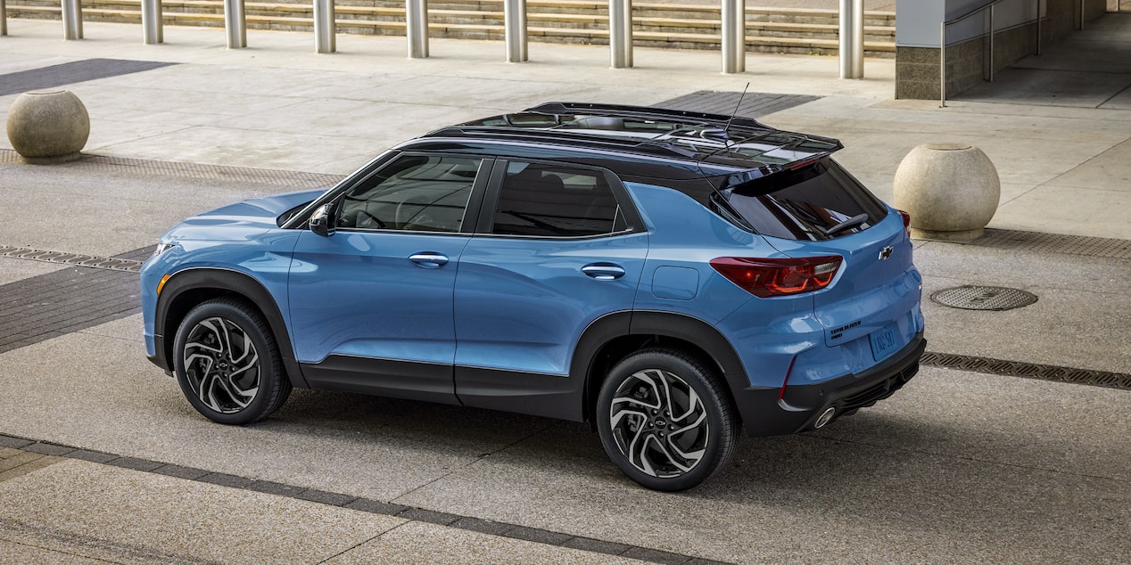 Side view of the 2026 Chevrolet Trailblazer RS trim driving in the city alone.