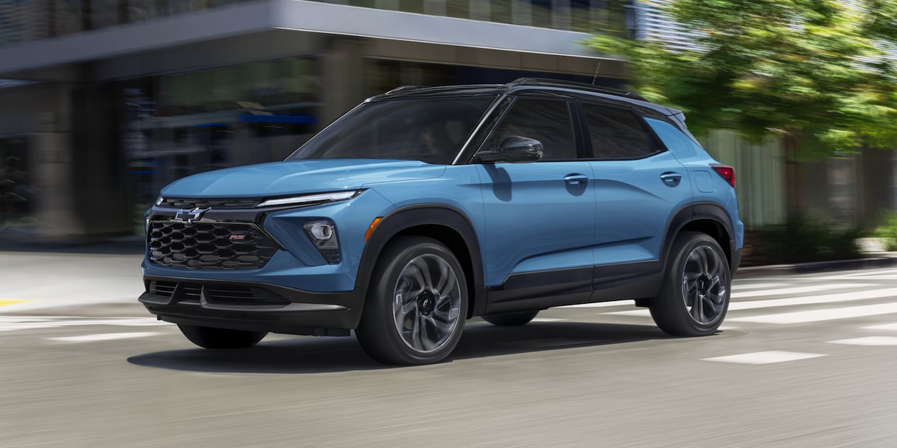 Front-side view of the 2026 Chevrolet Trailblazer RS trim driving fast in the city.