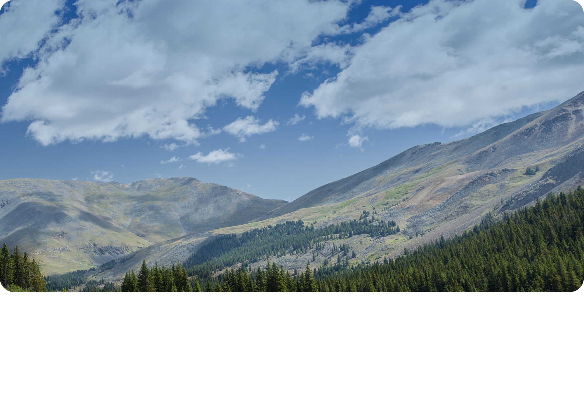 Forest in a Mountain Valley backplate for the 2026 Chevrolet Traverse.