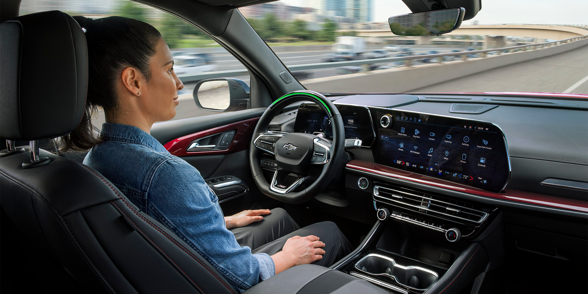 A Person Using the Hands-Free Super Cruise Driving Feature inside the 2026 Chevrolet Traverse.