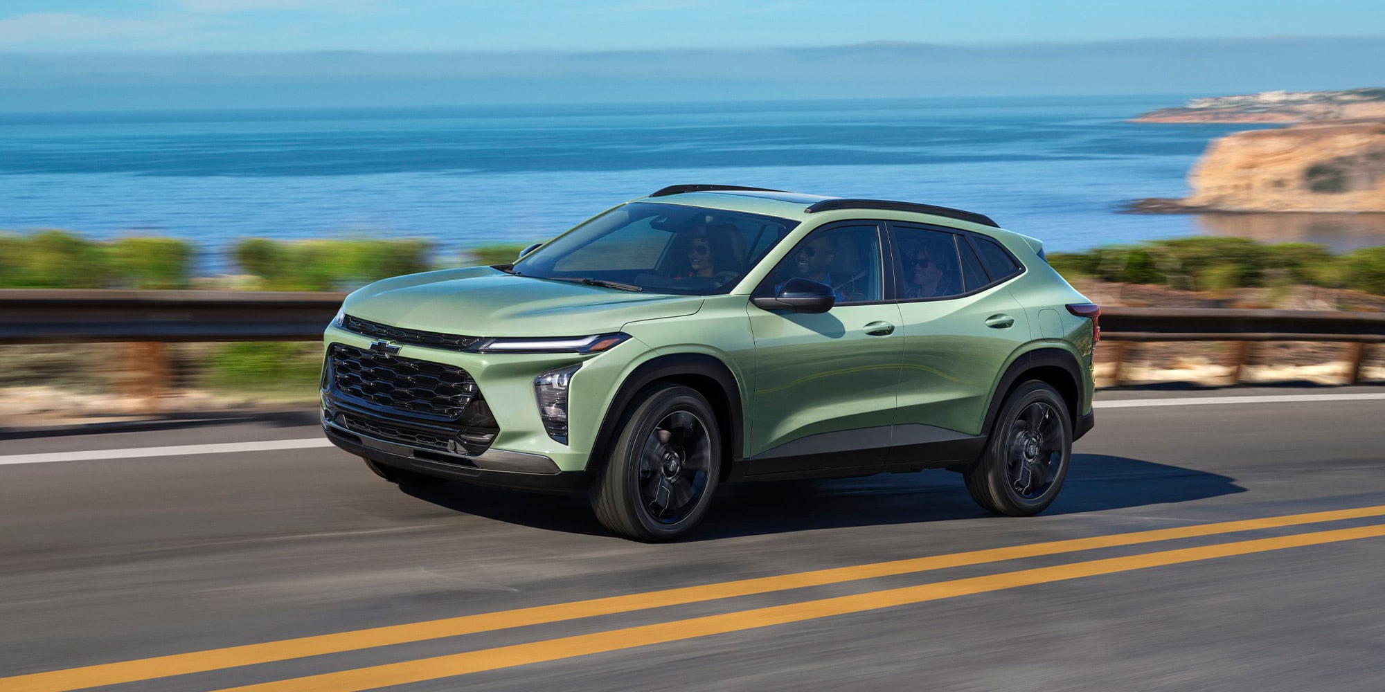 2026 Chevrolet Trax driving alone on the bridge.