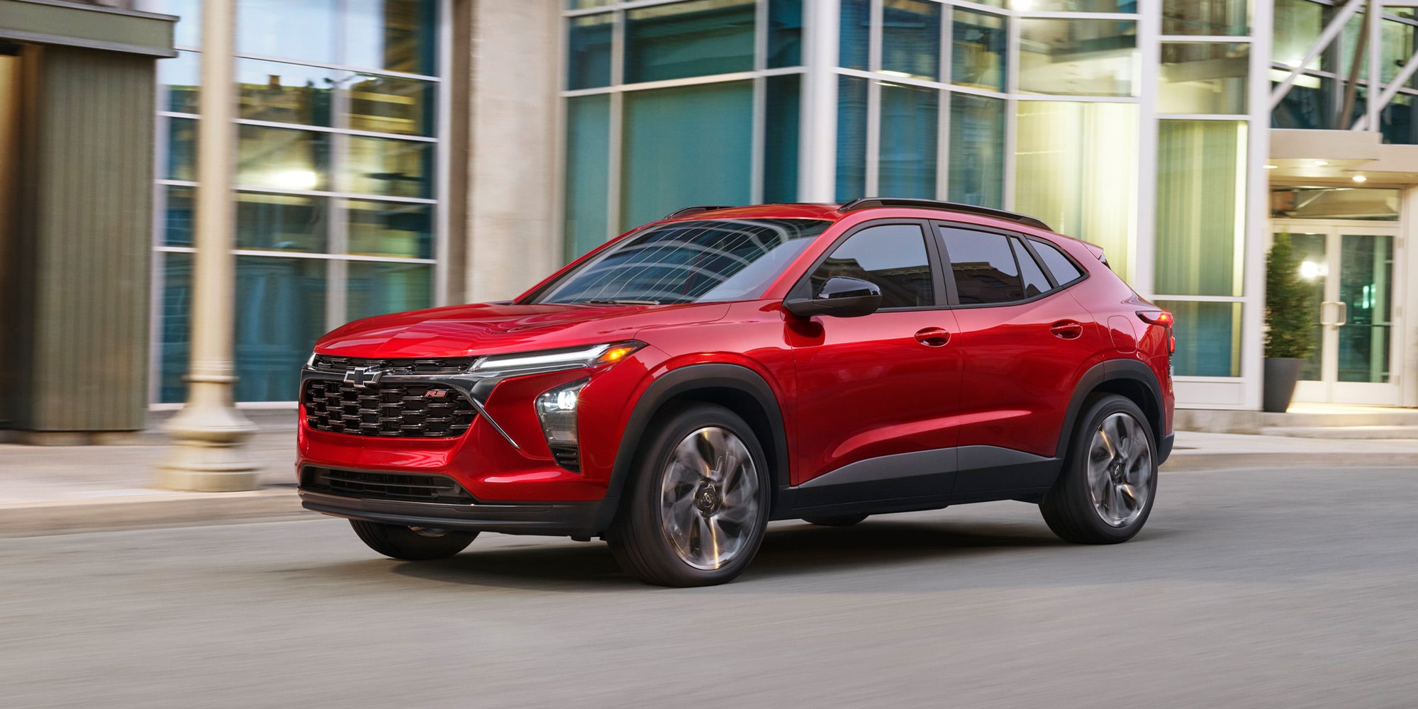 2026 Chevrolet Trax Parked in Front of an Apartment Building.