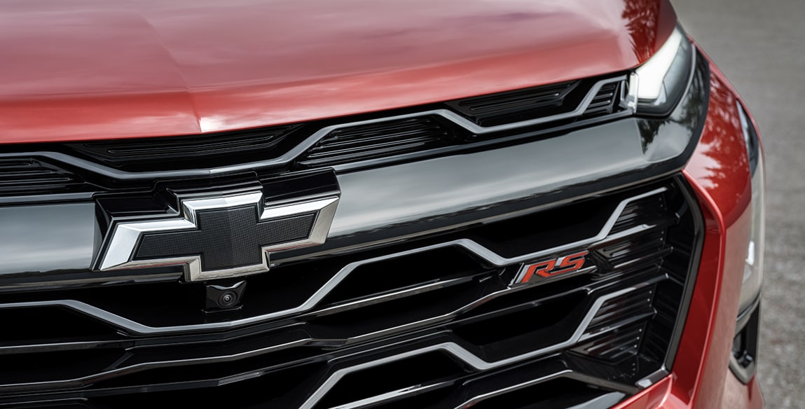 Close-up view of the Chevrolet badging on the front grille of the 2027 Chevrolet Equinox.