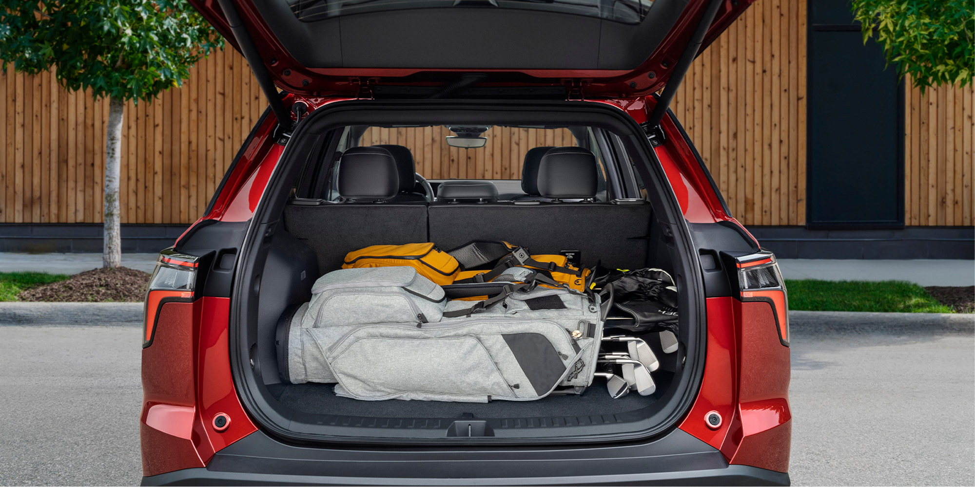 Back view of the 2027 Chevrolet Equinox with the trunk open.