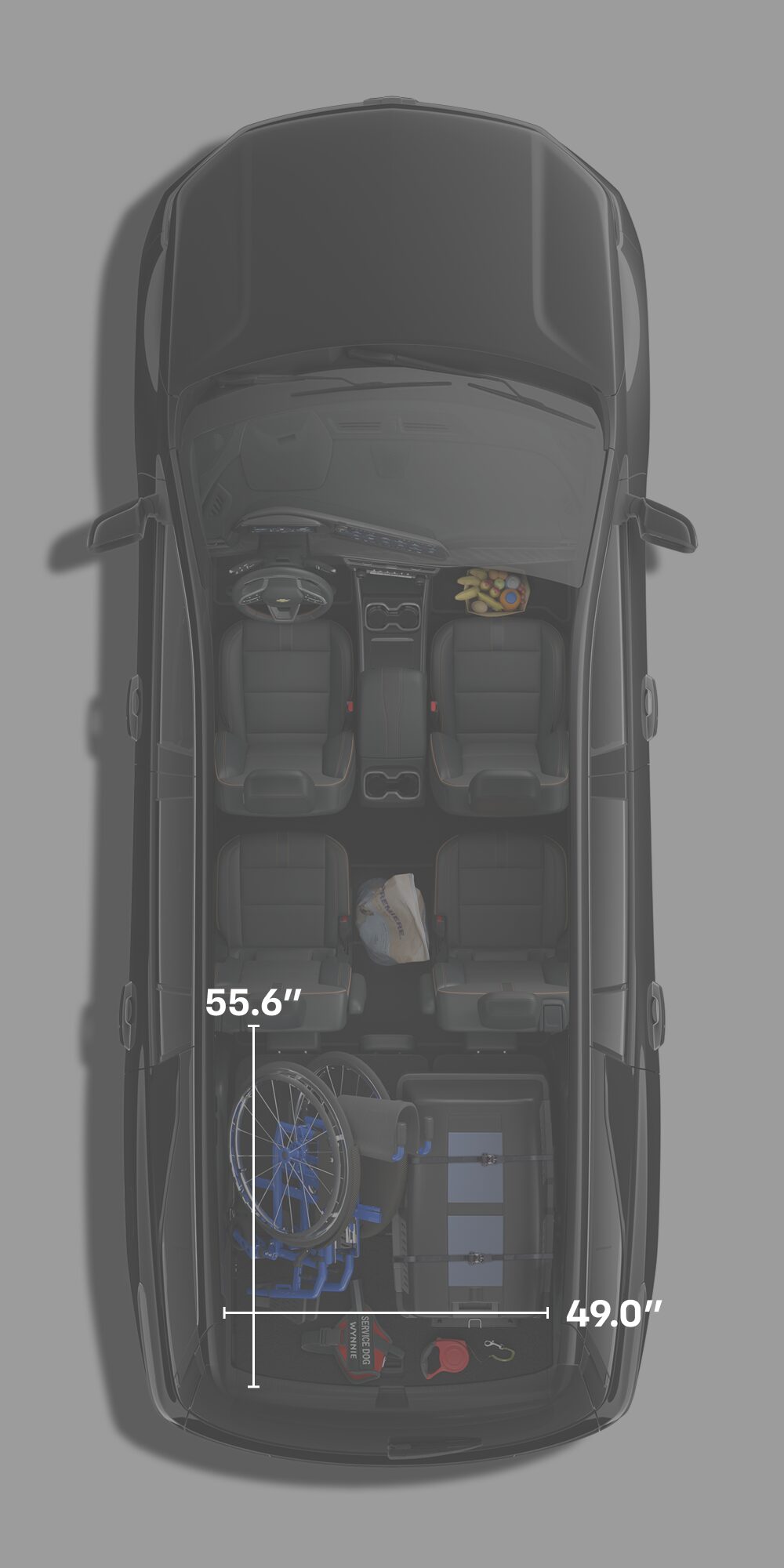 Mobility-related equipment being stored inside the 2027 Chevrolet Traverse with an overlay.