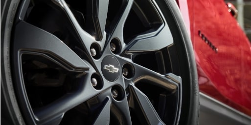 Chevrolet RS trim: Close up of tires and rims.