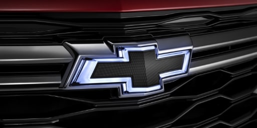 Chevrolet RS trim: Close up of head lights and grille.
