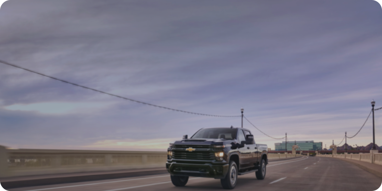 Background for 2025 Chevrolet Silverado WT EV.