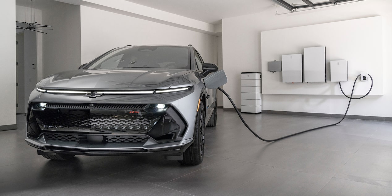 Official Chevrolet Canada image of a 2026 Equinox EV connected to a home charger