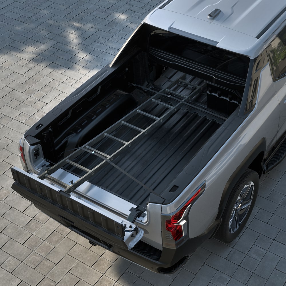 A ladder stowed on the cargo bed of the 2026 Chevrolet Silverado EV.