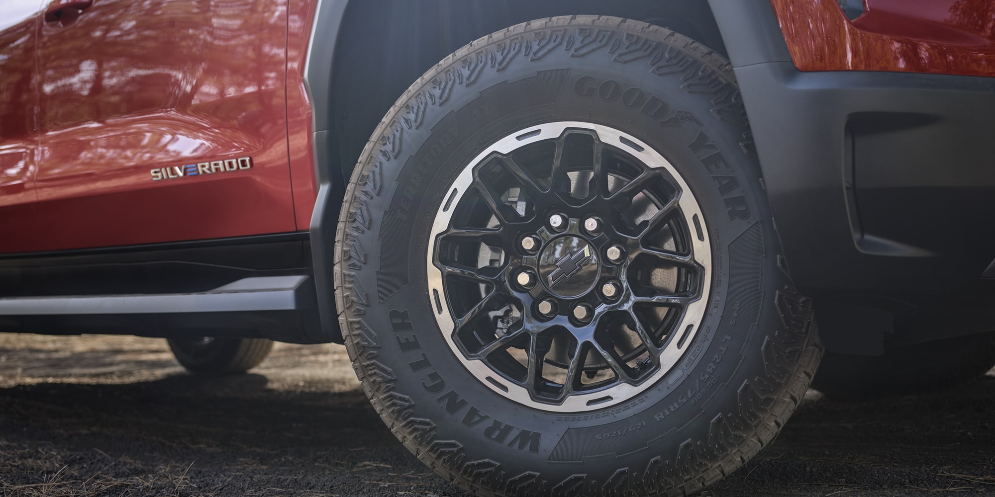 Close-up view of the aluminum wheels on the 2026 Chevrolet Silverado EV Trail Boss.