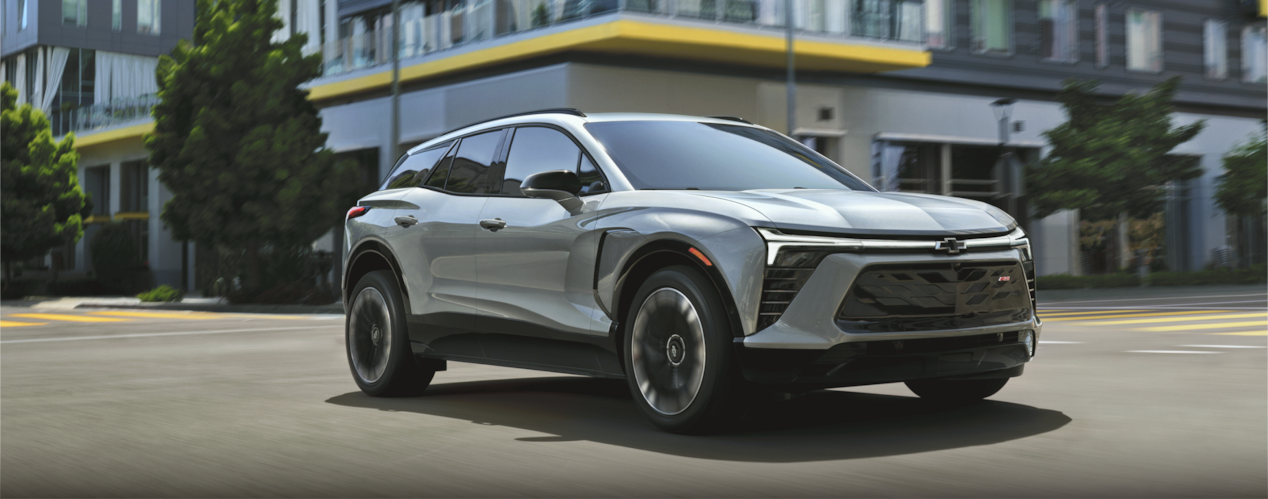 Front-side view of a Chevrolet Blazer EV parked in an outdoor parking lot.