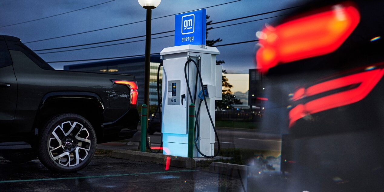 A Chevrolet electric vehicle charging at a public charging station.