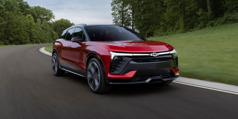 2024 Chevrolet Blazer EV driving on the road.