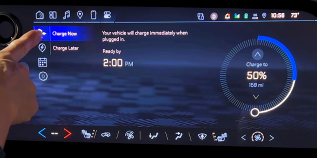 Close up view of the infotainment display showing charging information of a Chevrolet EV.