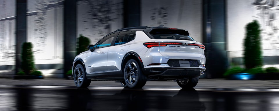 2024 Equinox EV Rear 3/4 Driving Shot at Night