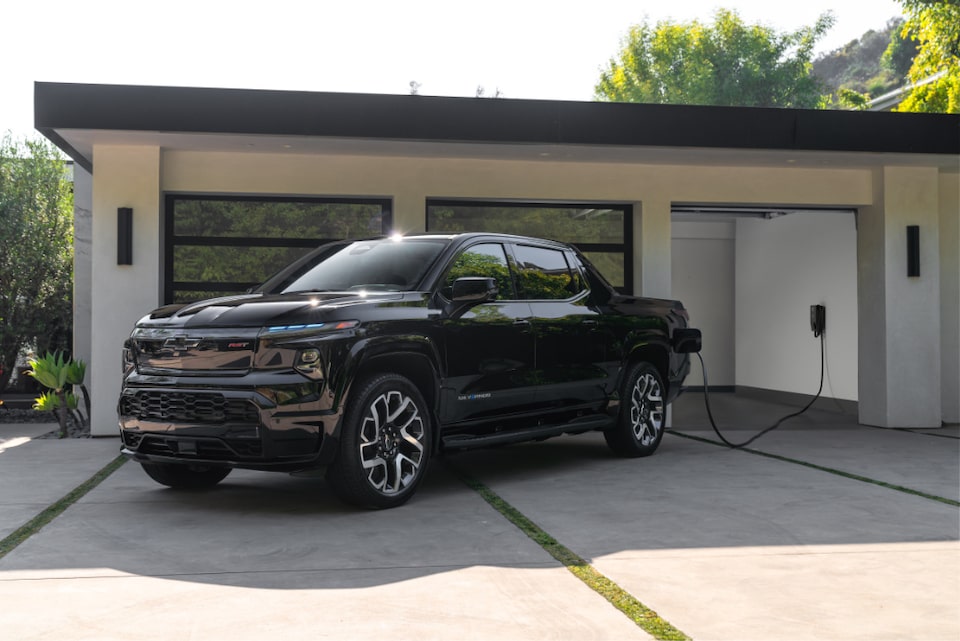 Silverado EV charging in a garage.