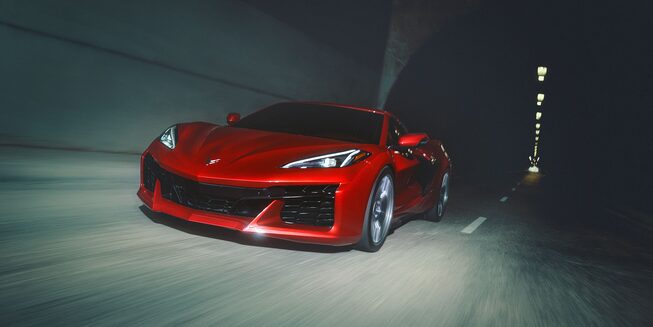 Front view of a 2023 Corvette Z06 driving in a tunnel.