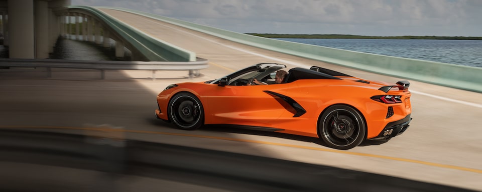 2023 Chevrolet Corvette Z06 driving through an overpass.