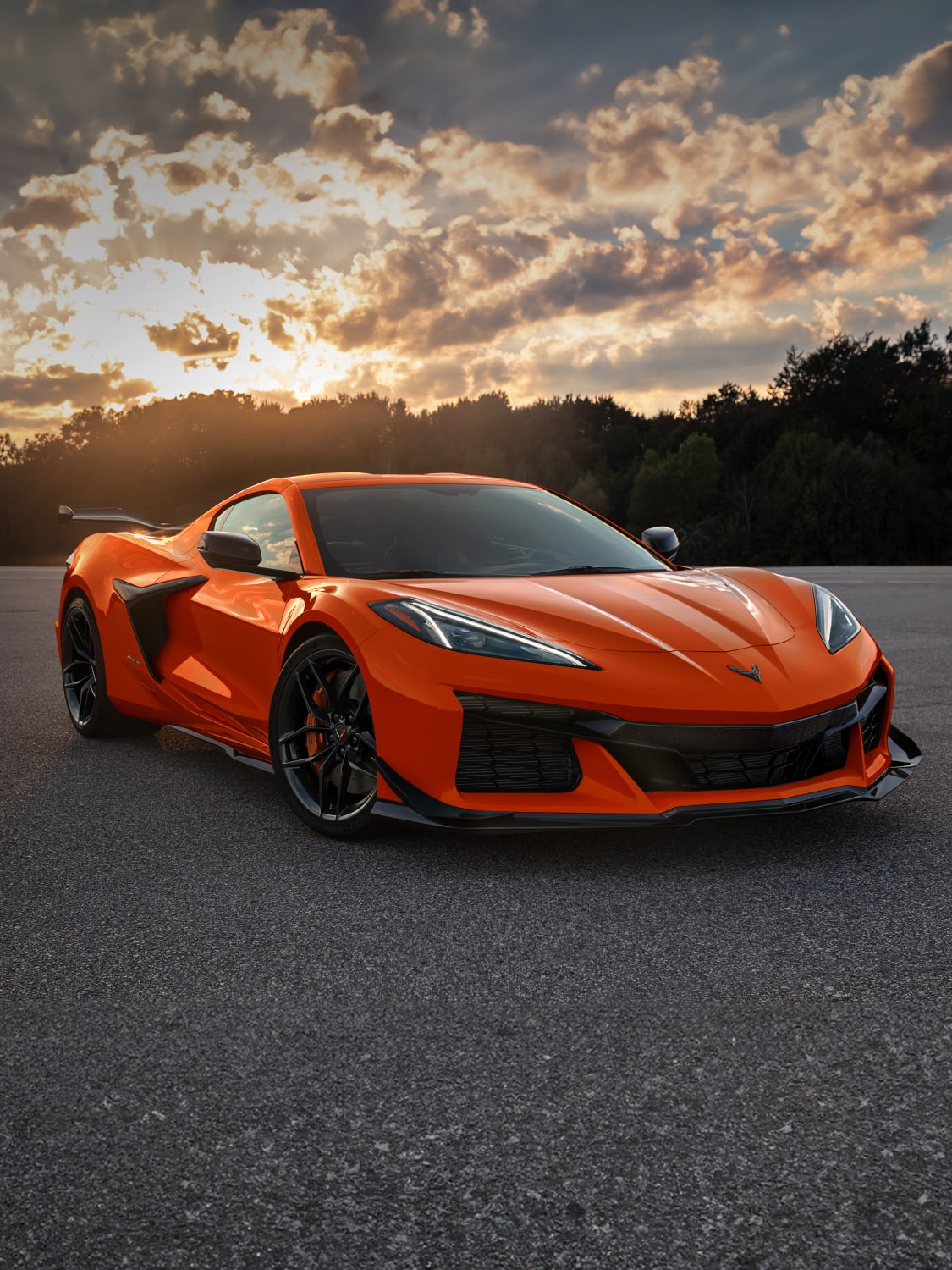 A 2025 Chevrolet Corvette Z06 parked outdoors during dawn.